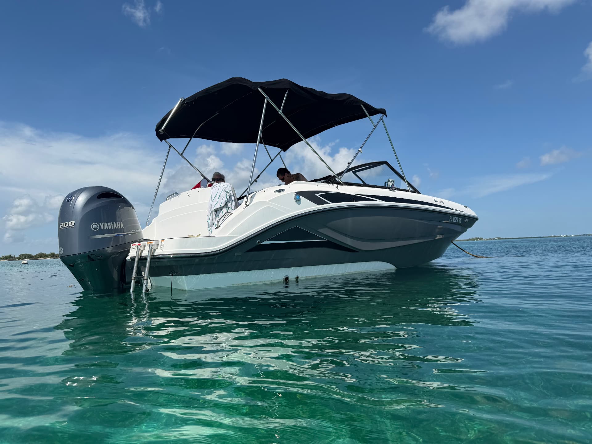 Mangrove Monkey Charters' new deck boat in clear turquoise water near Big Pine Key