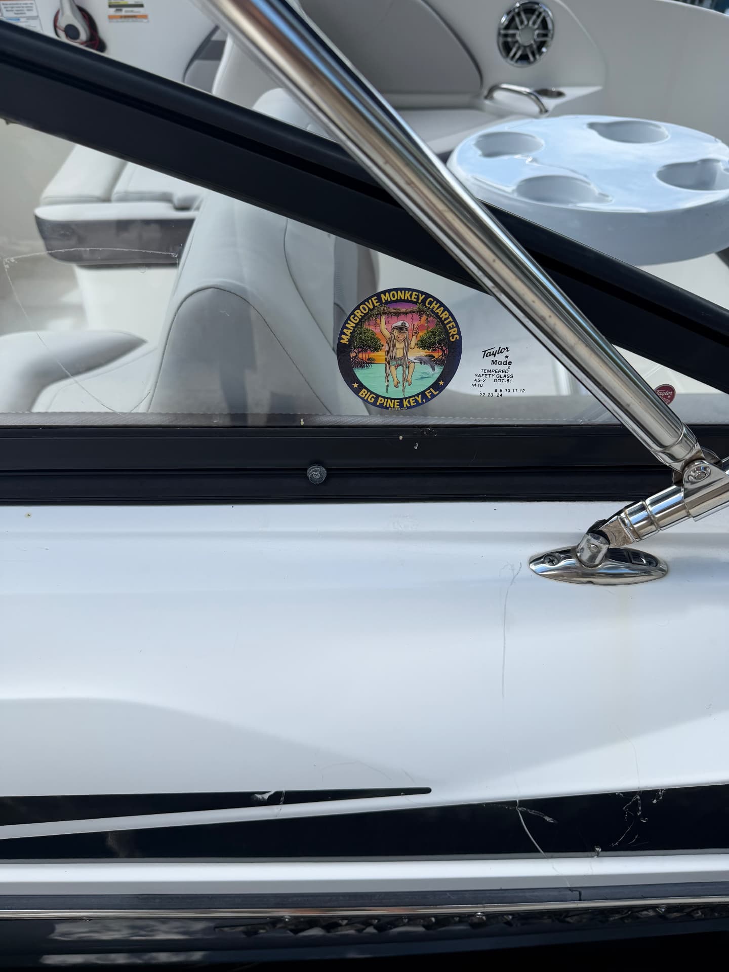 Windshield with Mangrove Monkey Charters logo sticker