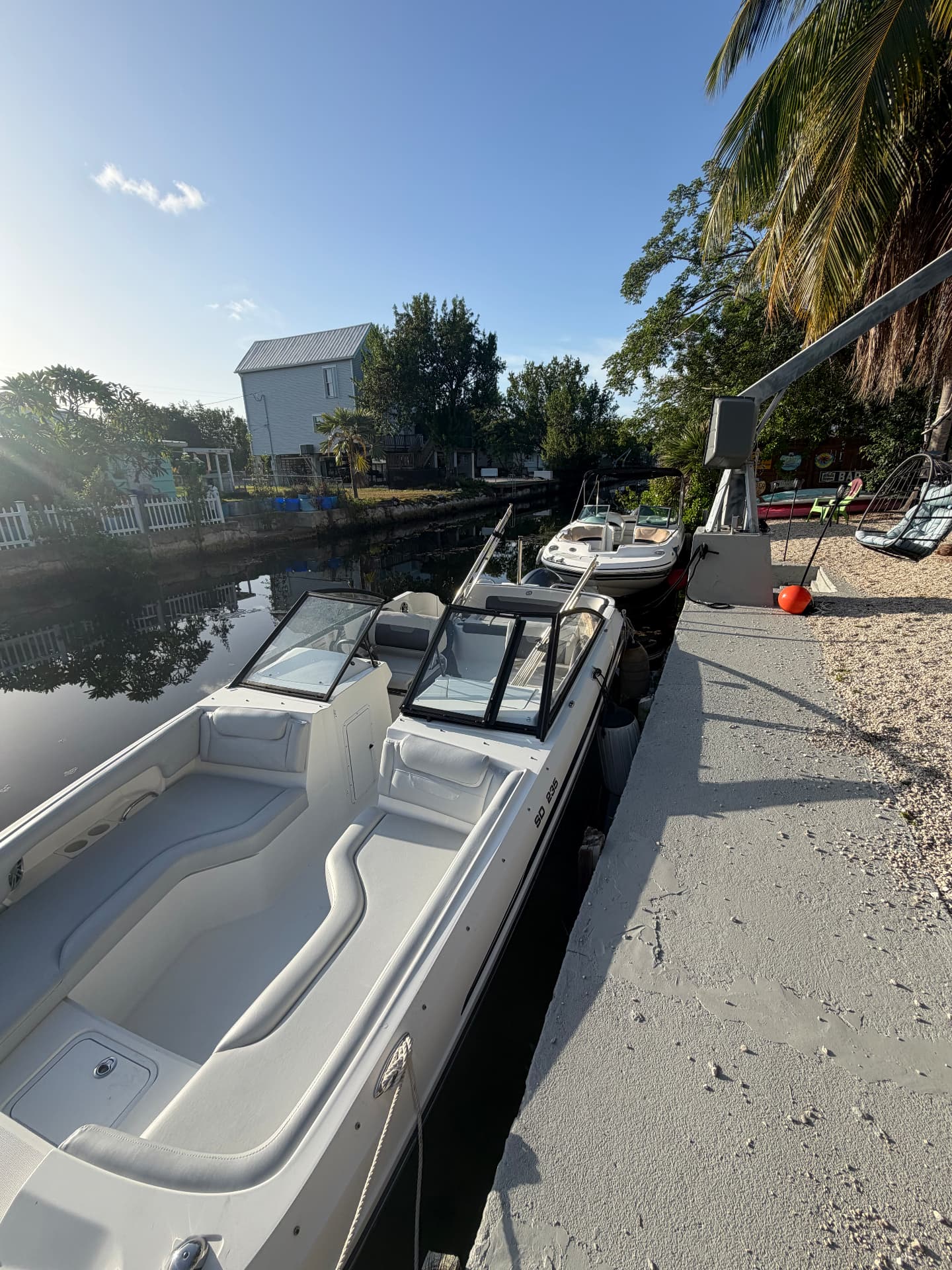 The charter boat docked in a quiet Big Pine Key canal at golden hour